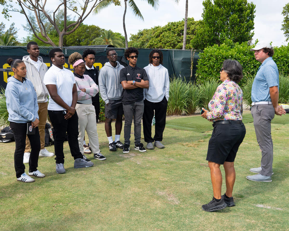 Urban Golf Weekend is hosting its five-day long event series that includes a charity golf tournament and two-day expo, is returning to Miami Beach for its third year. The organization had a role in restarting Booker T. Washington’s golf program. The photo shows a group of students at a golf clinic.